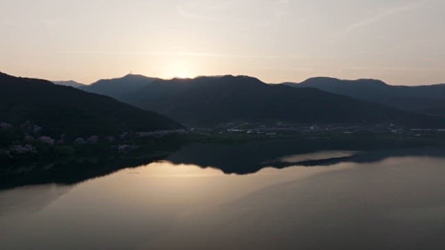 Sunrise over a tranquil mountain lake