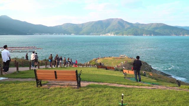 People enjoying a scenic coastal view