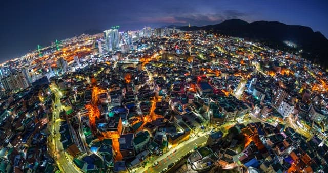 Vibrant cityscape at night with glowing lights