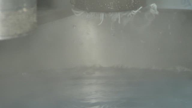 Buckwheat Noodles Coming Out of a Machine