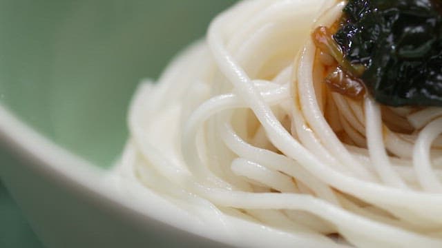 Bowl of noodles with seaweed topping