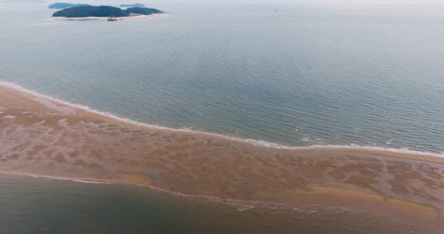 Sandbank Exposed in the Middle of the Sea