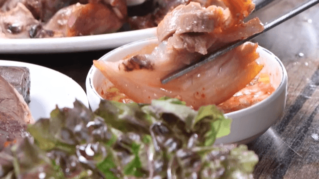 Delicious piece of pig's feet dipped in salted shrimp