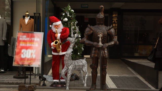 Santa Claus Figure Playing Saxophone Outdoors