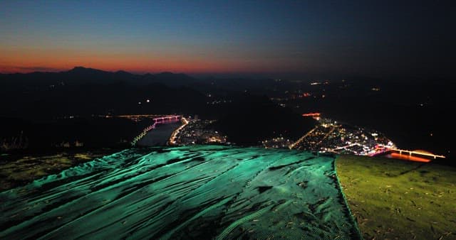 Scenic Overlook at Dusk with Vehicle
