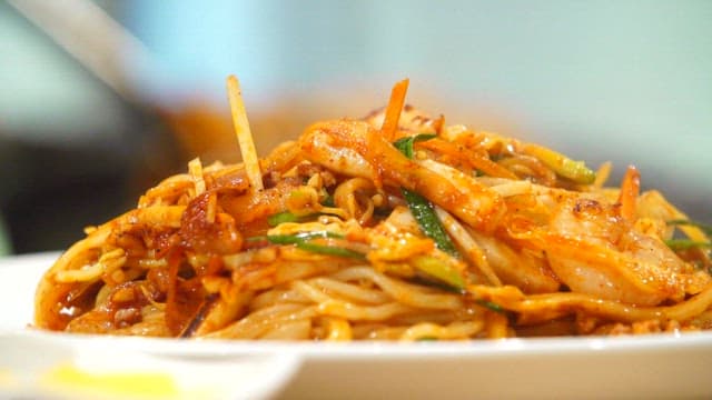 Spicy stir-fried jjambbong with plenty of seafood and vegetables