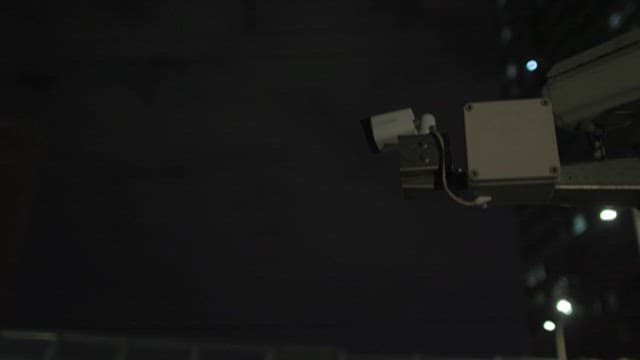 Surveillance Camera Overlooking City at Night