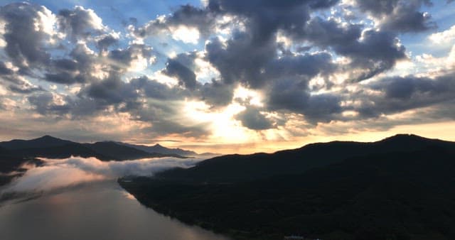 Sunrise over mountains and river