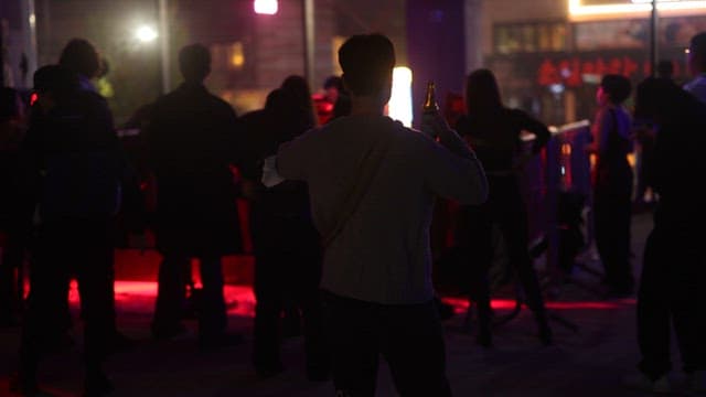 Club Crowded with People Enjoying Music and Dancing