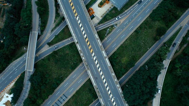 Highways and overpasses with many cars passing by