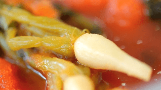 Refreshing yeolmu kimchi in a red sauce