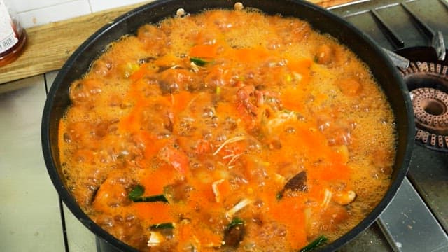 Boiling spicy seafood stew with crab