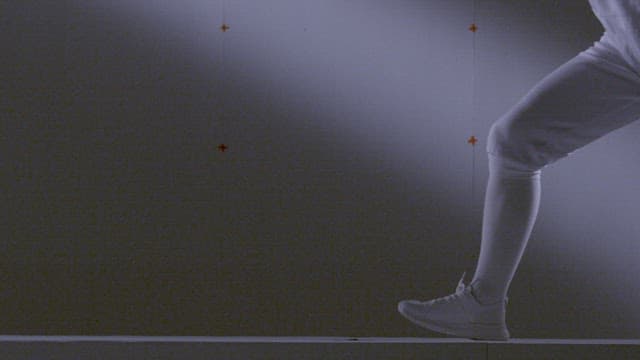 Agile Footworks of Two Fencers in Duel