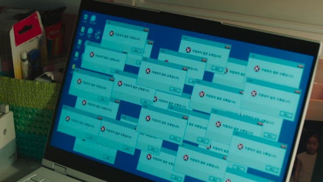 Laptop screen filled with error messages and antivirus software