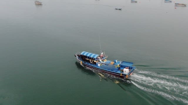 Ship crossing the calm sea