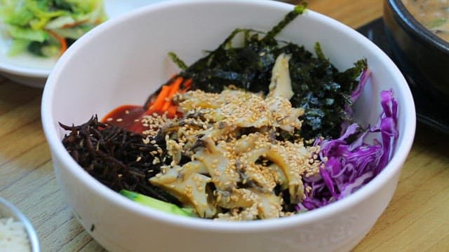 Korean bibimbap and soybean stew on a table