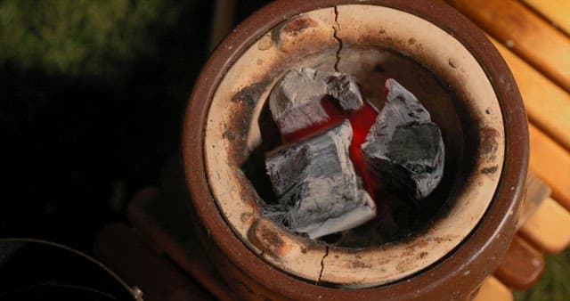 Glowing Charcoal in a Traditional Stove