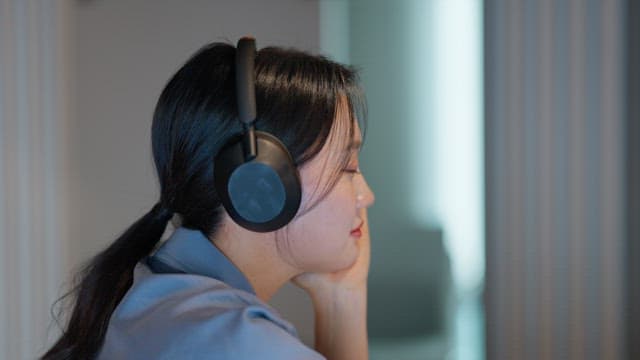 Woman enjoying music with headphones