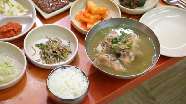 Korean style meal with bone soup and tteokgalbi