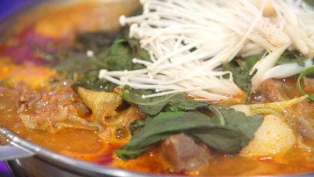 Pork backbone stew with fresh vegetables