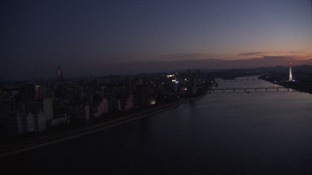 Sunrise in Pyongyang with Flowing Taedong River