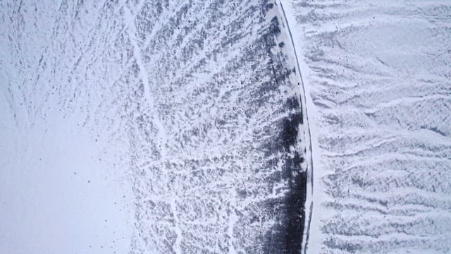 Snow-covered volcanic crater in winter