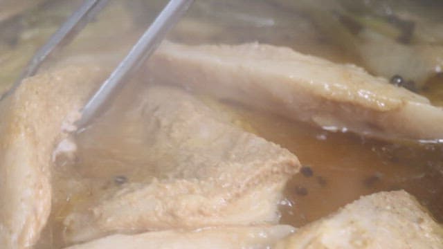 Boiling Meat in a Pot with Seasoning