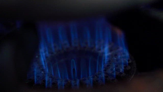 Stew with green onions boiling on the stove