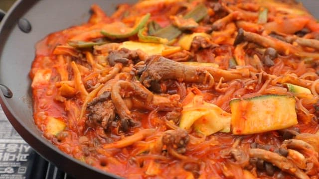 Pork stir-fry with noodles and oyster mushrooms