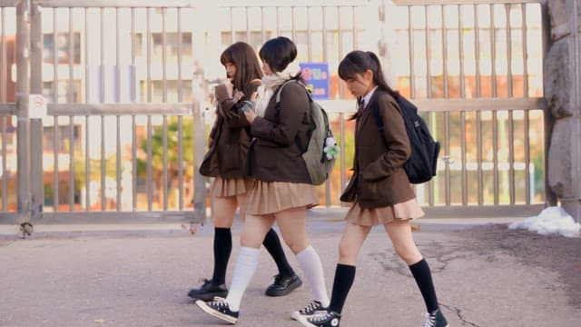 Students leaving school in winter