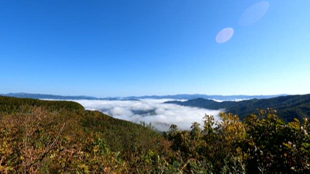 Scenic View Over Cloud-Covered Valleys