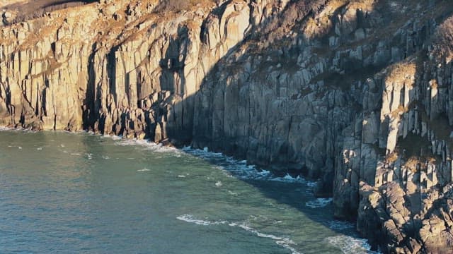 View of Rocky Seashore with Waves
