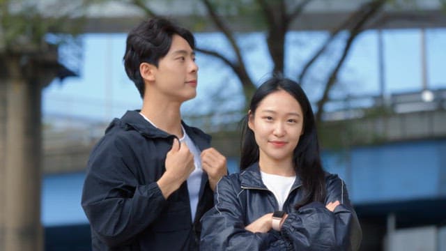 Couple standing outdoors in casual wear