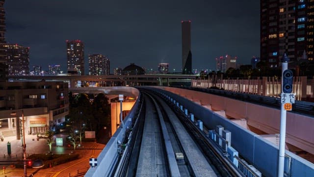City night view from inside the train
