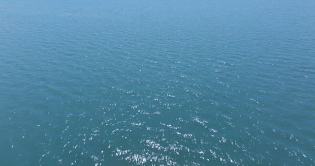 Silhouette of an Island on a Sea that Sparkles like a Jewel