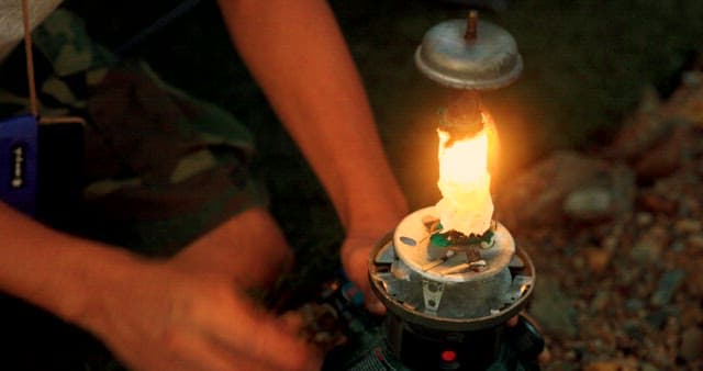 Lighting a Lantern during a Camping Trip