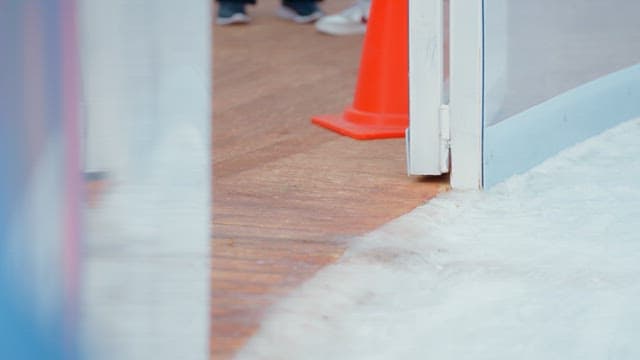 Ice resurfacer entering the ice rink