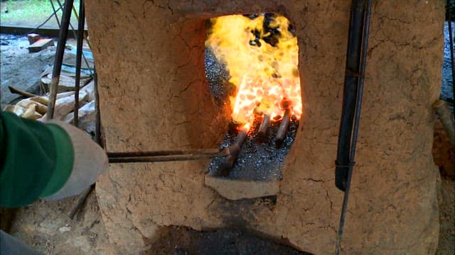 Blacksmiths who melt metal to make nails