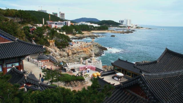 Haedong Yonggungsa Temple with tourists and sea view