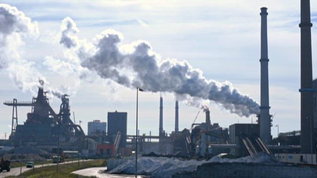 Factory chimney with smoke coming out