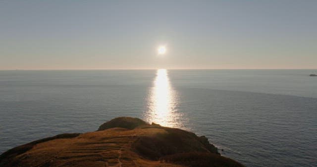 Sunset over a tranquil coastal seascape