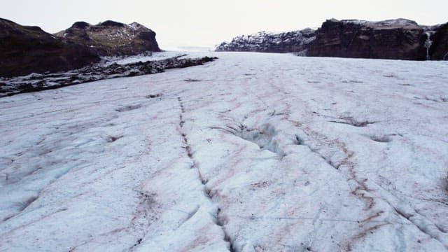 Expansive glacier landscape with mountains