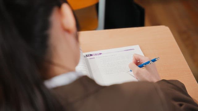 Student studying in a classroom