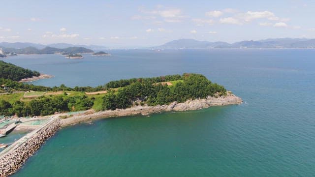 Scenic island surrounded by blue sea