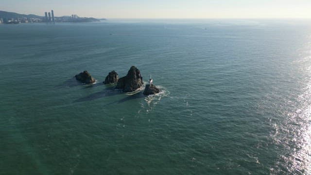 Rocky island surrounded by calm sea