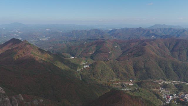 Expansive view of lush green mountains