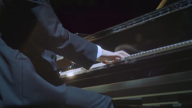 Elegant Pianist Performing a Classic Piece