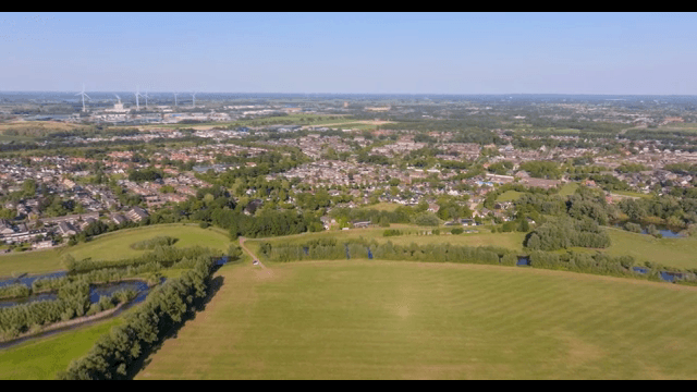 Aerial view of a suburban area with fields