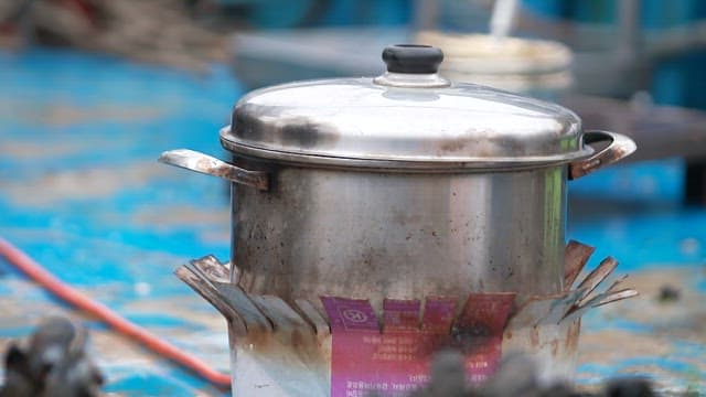 Mussel shells piled up in front of the pot