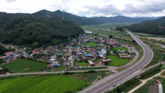 Aerial View of Rural Village and Highway